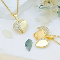 Opvouwbare gouden hartketting met zirkoon en creatief klavertje vier vleugelontwerp - Hart Op Het Eerste Gezicht (XL2150) / Goud