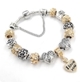 Silver snake chain bracelet with heart charms and I Love You pendant on white background - Silver Gold Heart Flower Style