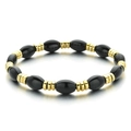 Bracciale elastico con perline nere lucide e distanziatori in metallo dorato a coste - Stile Bracciale con Perline Nero e Oro (XIAJIASL1583)