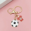 Soccer keychain featuring a black and white ball with a red soccer jersey charm - Soccer Jersey Style (5995286531311)