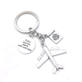 Silver metal travel keychain with airplane, passport charm and engraved quote on white background - Passport Inspirational Plate Airplane Style (6# Large Airplane)
