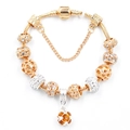 Gold snake chain charm bracelet with hollow beads, sparkling crystals and amber pendant - Gold Amber Gem Style