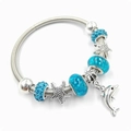 Pulsera temática marina con cuentas de vidrio azules, dijes de estrella de mar y delfín - Delfín Estrella de Mar (Azul) / Azul