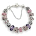 Bracelet DIY en perles de cristal roses et mauves sur une chaîne serpent argentée - Violet