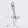 Silver metal keychain featuring a textured ribbon bow pendant with product dimensions - Small Bowknot Door Buckle Chain