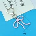 Pink ribbon bow keychain with silver heart-shaped metal clip for handbags and phones - Pink Bowknot Silver Heart Buckle