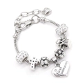 Detalle de una pulsera plateada con cuentas, cruz, ángel y colgante First Communion - 19+5cm-Cuenta Blanca