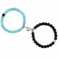 Bracciali di coppia in pietra vulcanica con ciondolo a cuore magnetico su sfondo bianco - Turquoise Frosted Stone