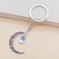 Retro silver moon keychain featuring a hollow crescent design with an owl pendant - Moon and Owl