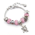 Silver snake chain bracelet with pink rhinestones and sea turtle charms on white background - Ocean Starfish Turtle Style (4#)