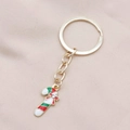 Detail of Christmas candy cane keychain in gold alloy with red and white enamel finish - Candy Cane Style (5#)