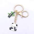 Panda and bamboo alloy keychain with black and white enamel finish in gold plating - Sitting Panda Style