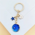Porte-clés signe Cancer avec pendentif lune étoilée bleue et étoile dorée - Cancer