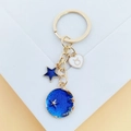 Porte-clés signe Taureau avec pendentifs lune étoilée bleue et cœur en métal doré - Taureau