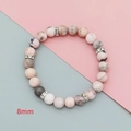Close-up of 8mm pink zebra jasper beads with sparkling diamond-encrusted silver spacers - Pink Zebra Small Size Silver Rhinestone Style