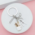 Creatieve zilveren sleutelhanger met liniaal, passer en pennenhouder op standaard - Witte Penhouder Stijl