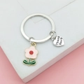 Detail of Thank You engraved heart charm and pink flower keychain on white display stand - Pink Flower