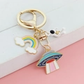 Cartoon astronaut keychain with white spaceman, rainbow and UFO metal pendants - Astronaut Rainbow UFO Style (LQ-0281#)