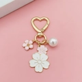 Pink and white cherry blossom heart keychain with gold enamel flowers and a pearl charm - Pink and White Bicolor Flower (Heart Buckle)