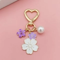 Cute heart-shaped keychain with purple cherry blossoms and an elegant white pearl - Purple and White Bicolor Flower (Heart Buckle)
