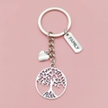 Porte-clés arbre de vie argenté avec pendentif family et cœur sur fond rose uni - Style Famille Et Arbre de Vie (Style B)