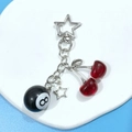 Resin cherry and black 8 ball keychain with silver star clip for handbags - Pentagram Style
