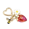 Porte-clés en forme de cœur doré avec breloques fraise en résine, abeille et marguerite - Fraise Rouge Avec Abeille En Strass