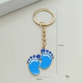 Blauw-witte babyvoetjes sleutelhanger met goudlaag, afmetingen 97mm lang en 30mm breed - Voetafdruk