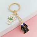 Porte-clés de remise des diplômes doré avec tulipe rose et pendentif robe noire - Style Toge Bleue et Tulipe (LQ-01875-4#)