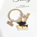 Golden graduation keychain with black mortarboard and 2023 scroll charm detail - 2026-4#kc Gold