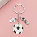 Portachiavi da calcio con mini maglia, scarpa e pallone da calcio in smalto nero e bianco - Stile Calcio Oro 1