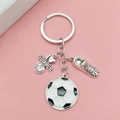 Silver soccer keychain featuring football shoes, ball charms and I heart soccer tag - Antique Silver Soccer Plate Style