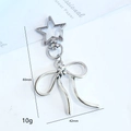 Porte-clés étoile argenté avec pendentif nœud pour sacs, hauteur 80mm et poids 10g - Pendentif nœud papillon (Fermoir pentagramme) / Argent