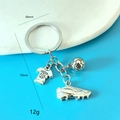 Silver soccer keychain with detailed football, jersey and boot pendants, 70mm length - Alloy 3D Soccer Style