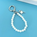 Porte-clés étoile argentée avec chaîne en perles blanches et pendentif céleste - Chaîne Étoile Perle / Argent