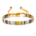 Detail of handmade MIYUKI Tila bead bracelet with colorful tile beads and adjustable cord - Yellow And Light Blue Splicing Style (SL033--4)