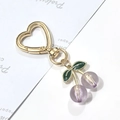 Golden heart-shaped clasp keychain with translucent lavender cherry charms and green leaves - Purple Cherry Green Leaf Heart Hook