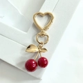 Golden cherry keychain with dual red fruits and heart-shaped clasp for backpacks - KC Gold Cherry (Heart Hook)