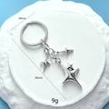 Porte-clés étoile à quatre branches en argent avec anneau 30mm et longueur 90mm - Porte-clés Étoile à Quatre Branches Argent