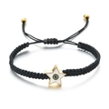 Handmade black woven rope bracelet with gold star evil eye charm and adjustable closure - Black