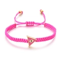 Detail of pink woven evil eye bracelet with adjustable cord and golden triangle charm - Rose Red