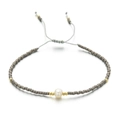 Pulsera Miyuki ajustable color topo con perla blanca central y detalles dorados - Topi (QQ357)