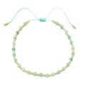 Close-up of handmade blue beaded bracelet with gold spacers and adjustable silk cord - Bracelet / Light Blue Faceted Bead Style (SL108-6)