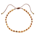 Detail of colorful faceted stone beads and gold spacers on an adjustable braided bracelet - Bracelet / Orange Red Faceted Bead Style (SL108-8)
