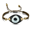 Detailed close-up of handmade woven evil eye bracelet with gold accents and zircon stones - Olive Green Rope Black Enamel Eye (QQSL012-6)