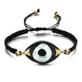 Macro detail of hand-woven Evil Eye bracelet with gold accents and crystal inlay - Black Rope Faux MOP Eye (QQSL012-8)