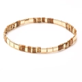 Macro view of retro Tila beads bracelet with golden metal and marble texture stones - SL854-Brown