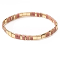 Detailed close-up of pink and gold Tila bead elastic bracelet with flat stone texture - SL858-Pink