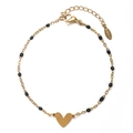 Golden stainless steel heart pendant bracelet with elegant black beads on white background - Black