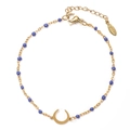 Detailed shot of golden stainless steel chain with blue beads and a crescent moon charm - Blue (XN320-BLUE)